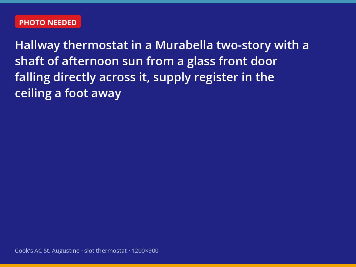Thermostat in direct sunlight next to a supply register in a Murabella hallway
